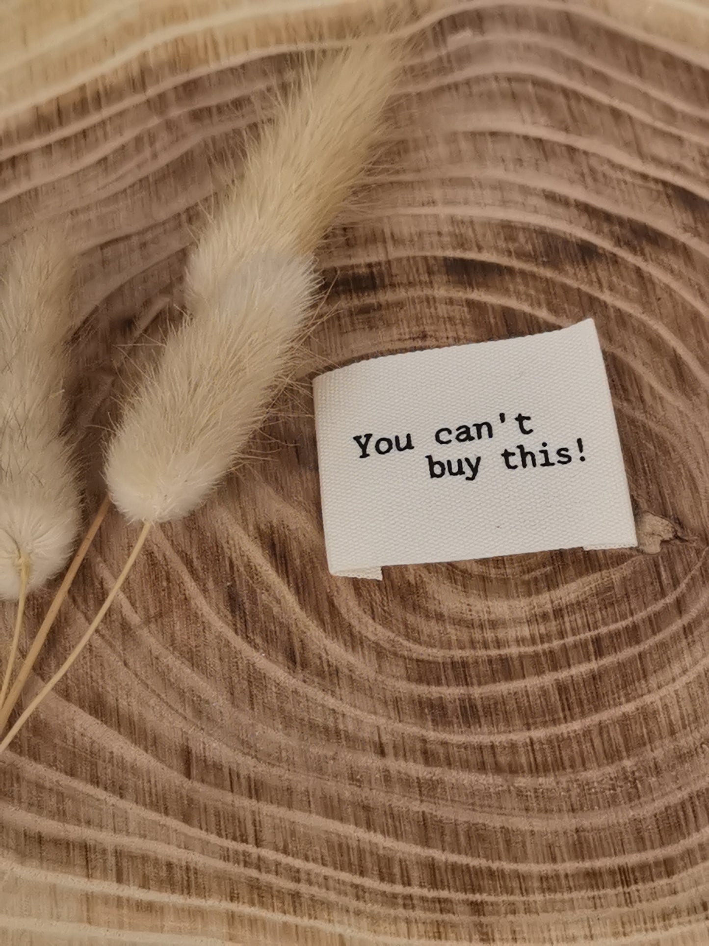 Baumwoll-Label You can't buy this