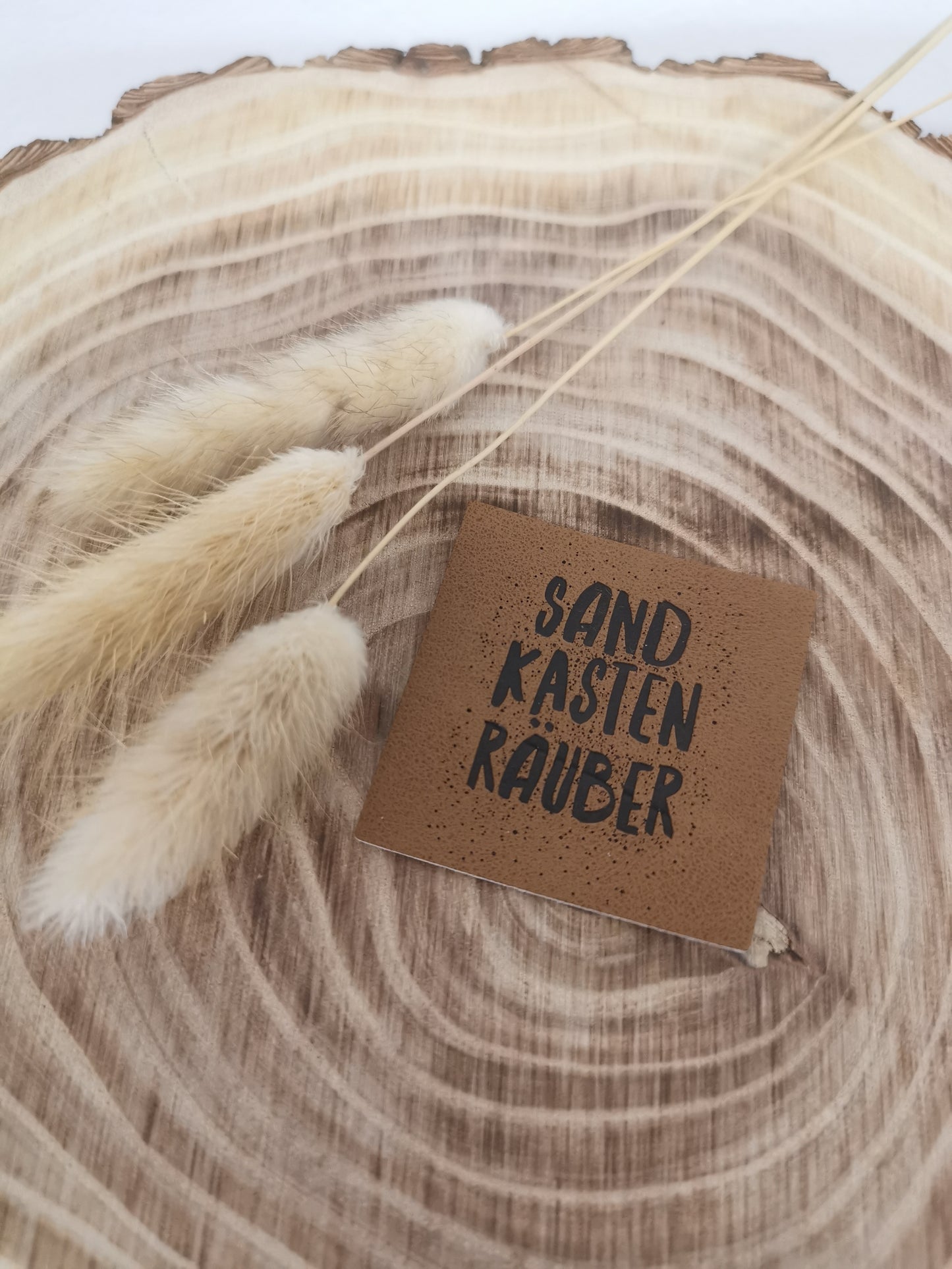Voleur de bac à sable d'étiquettes