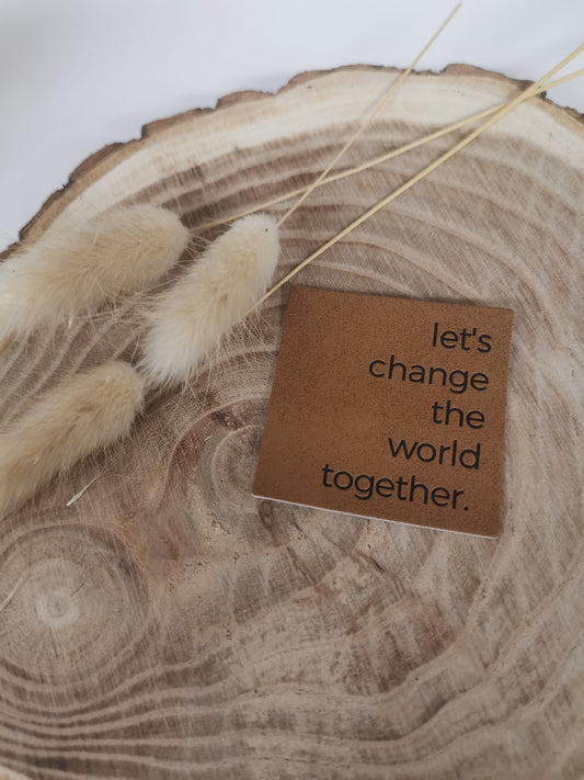 Kunstlederlabel let's change the world