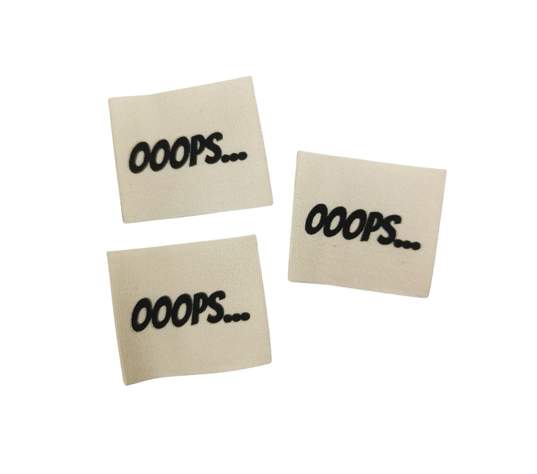 Baumwoll-Label Ooops..