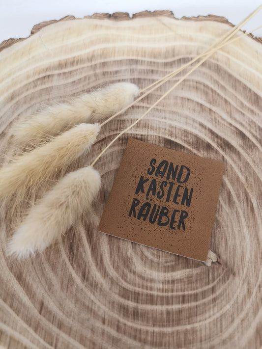 Label Sandkastenräuber