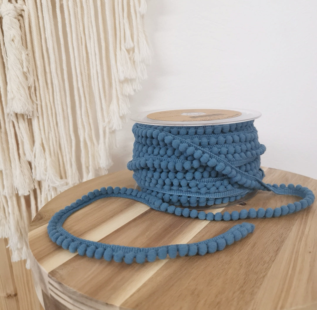 Jean bordure pompon